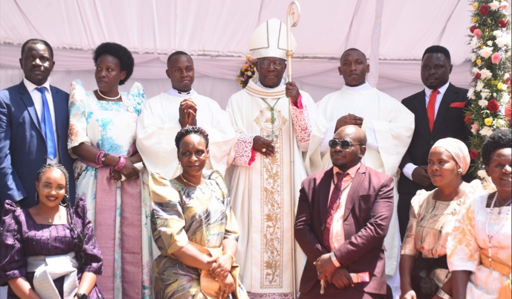 Some of the Political Candidates in a photo with Bishop Zziwa after mass at Kiyinda